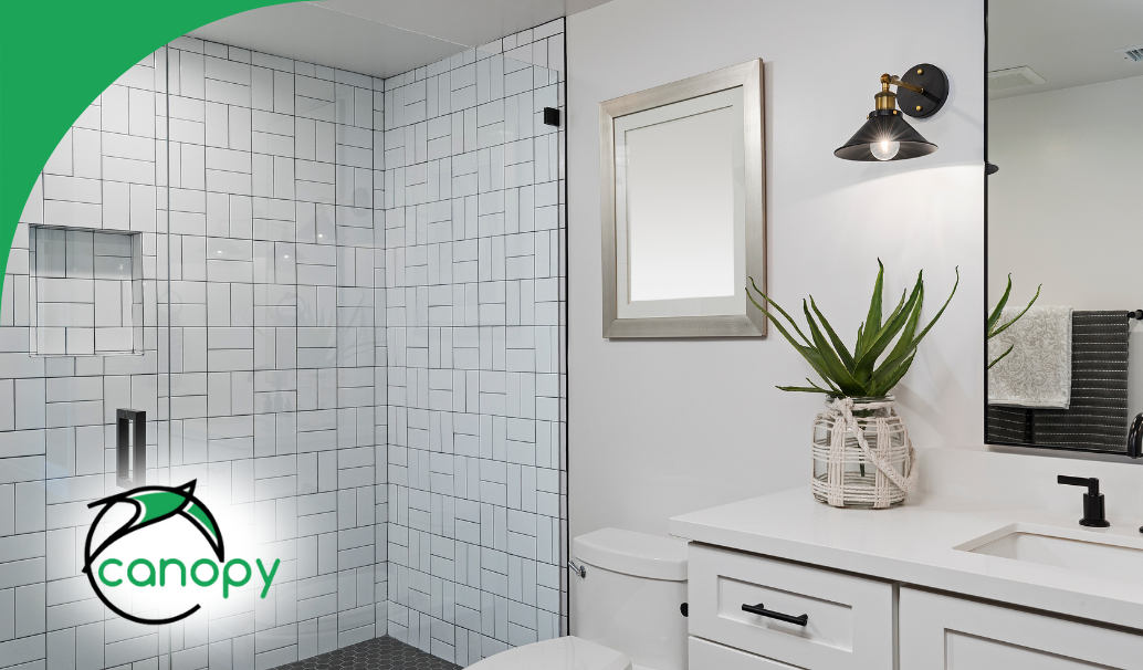 Modern bathroom remodel featuring a sleek walk-in shower with white geometric tile
