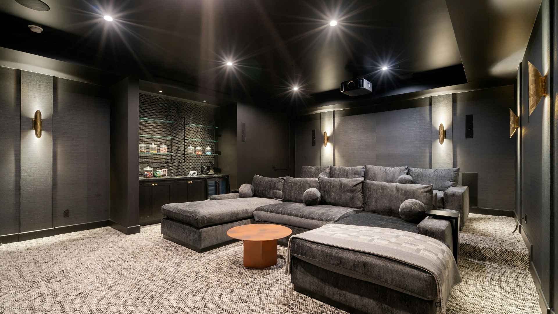 Basement entertainment room in Media, PA by Canopy Building Services